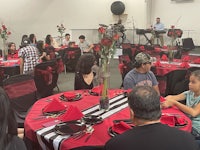 a group of people sitting at a table